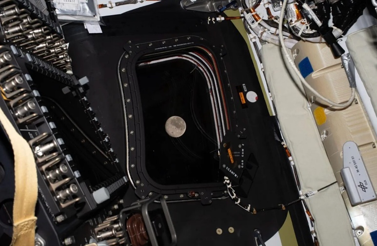 Pointing to the machinery of the Artemis II rocket, which is a metaphor for the Societal Mirror survey process.